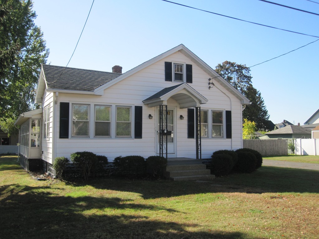19 Nichols Street Springfield, MA 01151 - Photo 1 of 13 a front view of a house with a yard