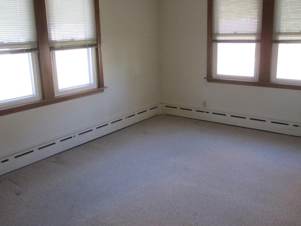 19 Nichols Street Springfield, MA 01151 - Photo 12 of 13 an empty room with a window