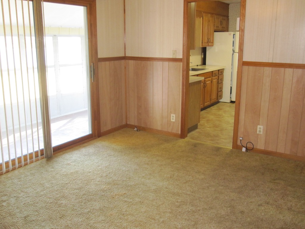 19 Nichols Street Springfield, MA 01151 - Photo 8 of 13 an empty room with windows