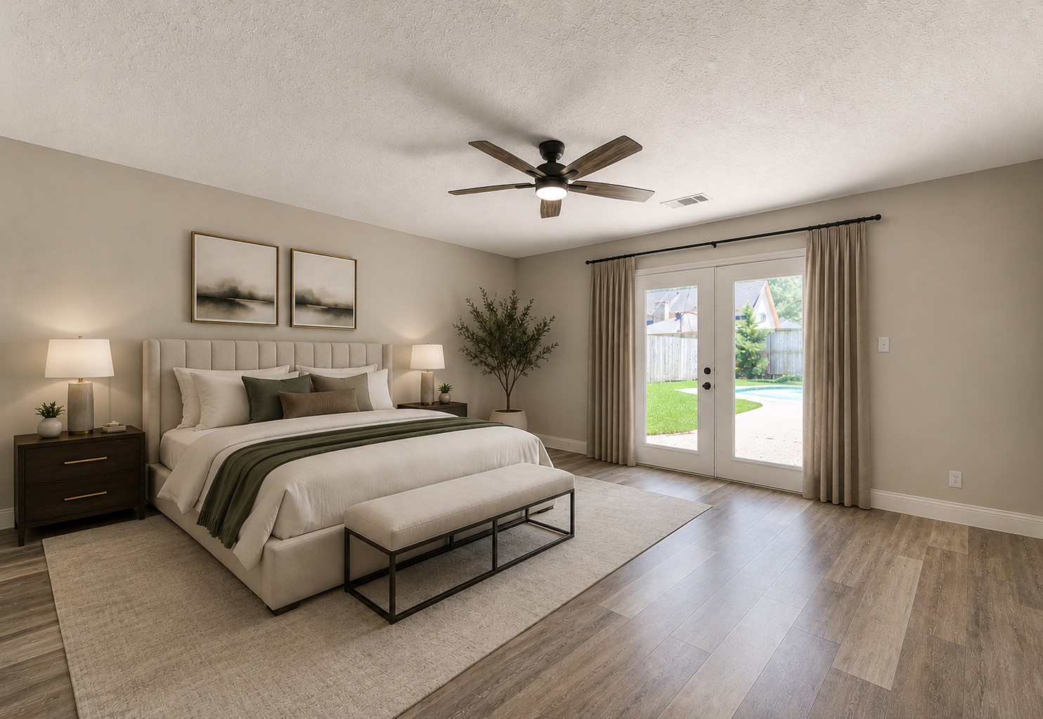 9115 Taidswood Drive Spring, TX 77379 - Photo 22 of 45 The primary bedroom is downstairs with French doors leading out to the pool area. This bedroom has a new remote-controlled ceiling fan.