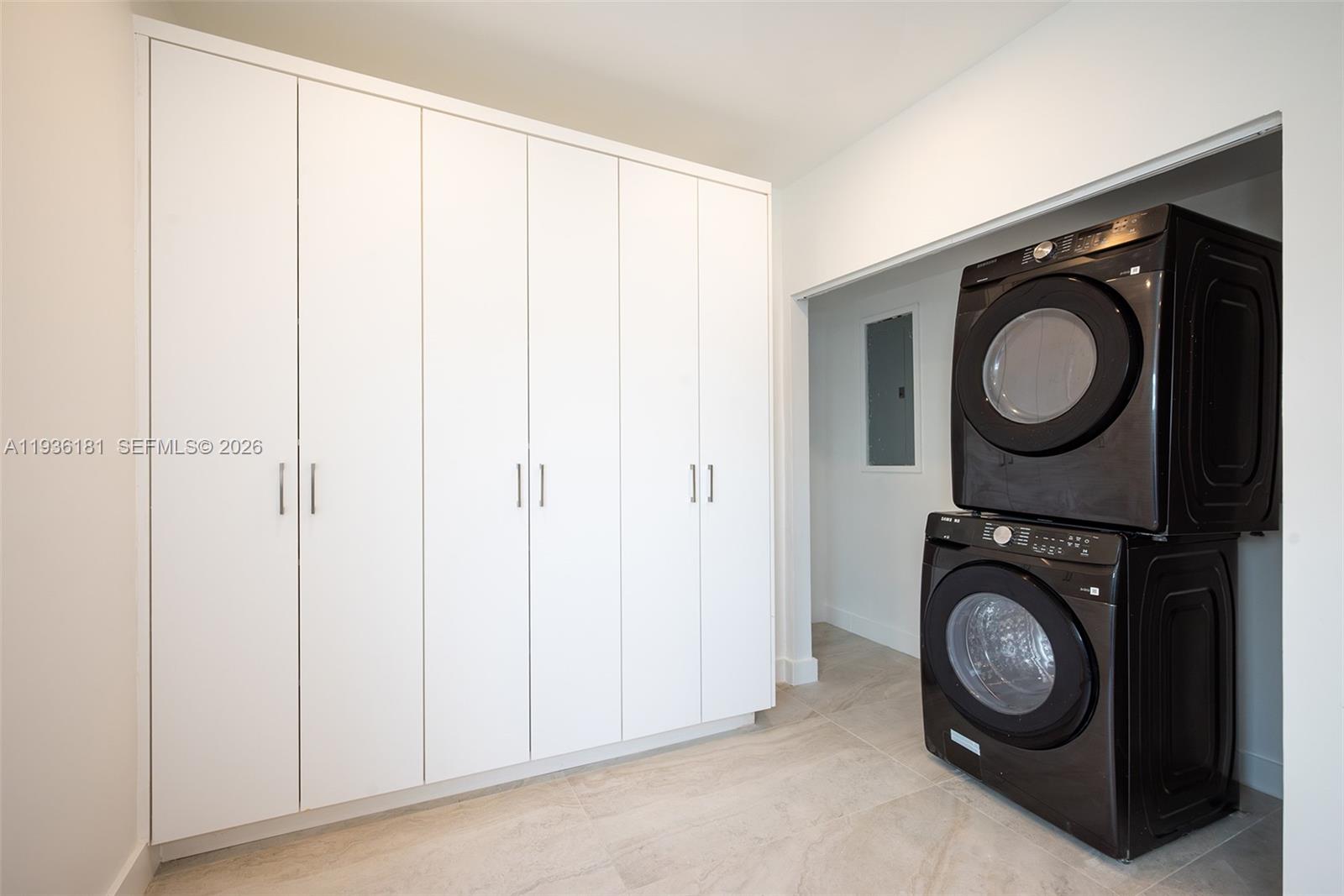 1511 Southwest 20th Court Miami, FL 33145 - Photo 16 of 41 a view of washer and dryer in a utility room