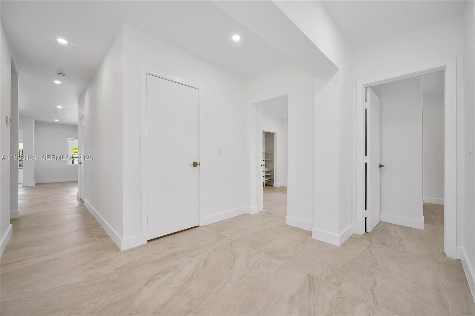 1511 Southwest 20th Court Miami, FL 33145 - Photo 21 of 41 a view of a hallway with wooden shelves