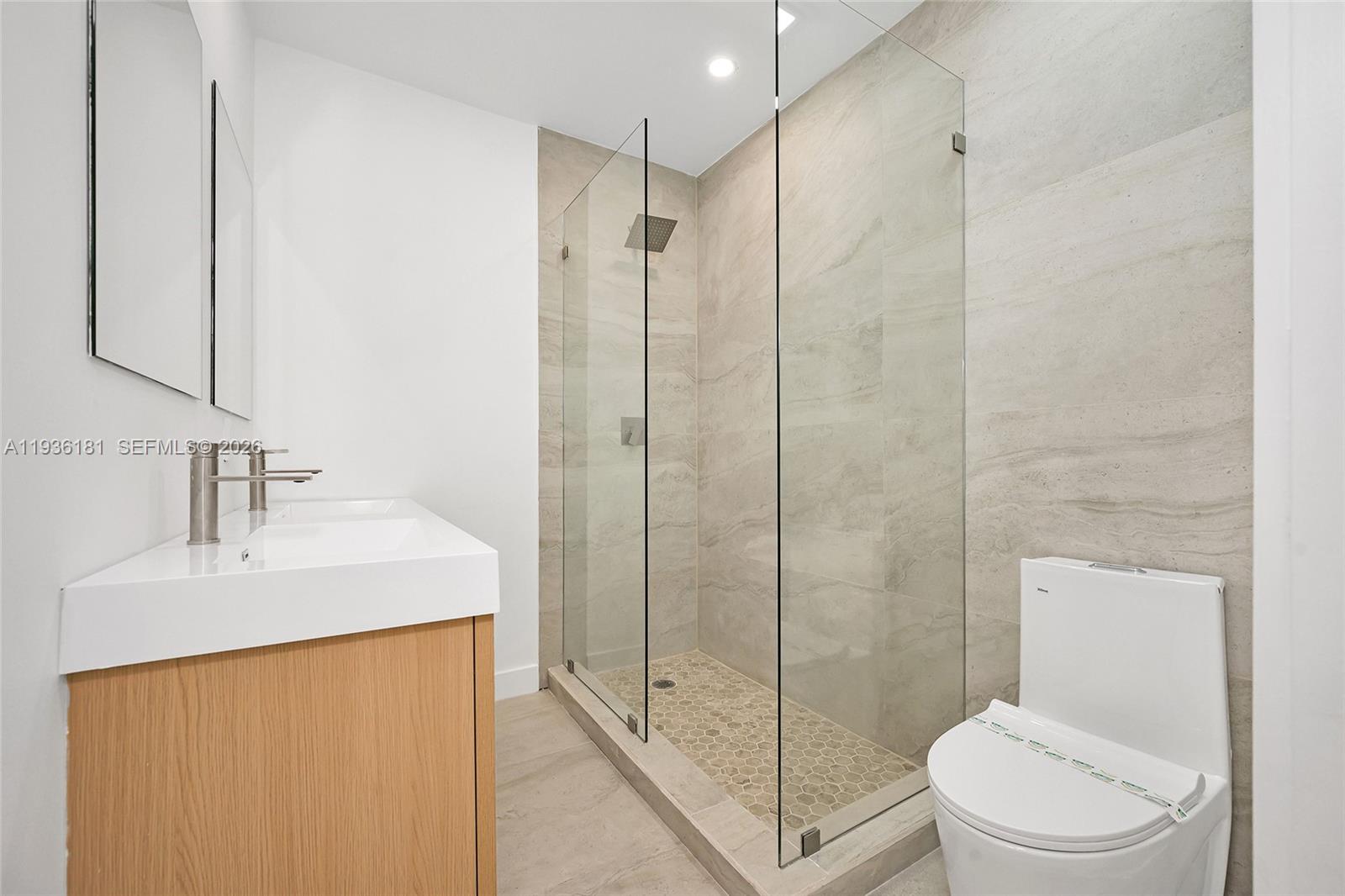 1511 Southwest 20th Court Miami, FL 33145 - Photo 24 of 41 a bathroom with a sink a toilet and shower