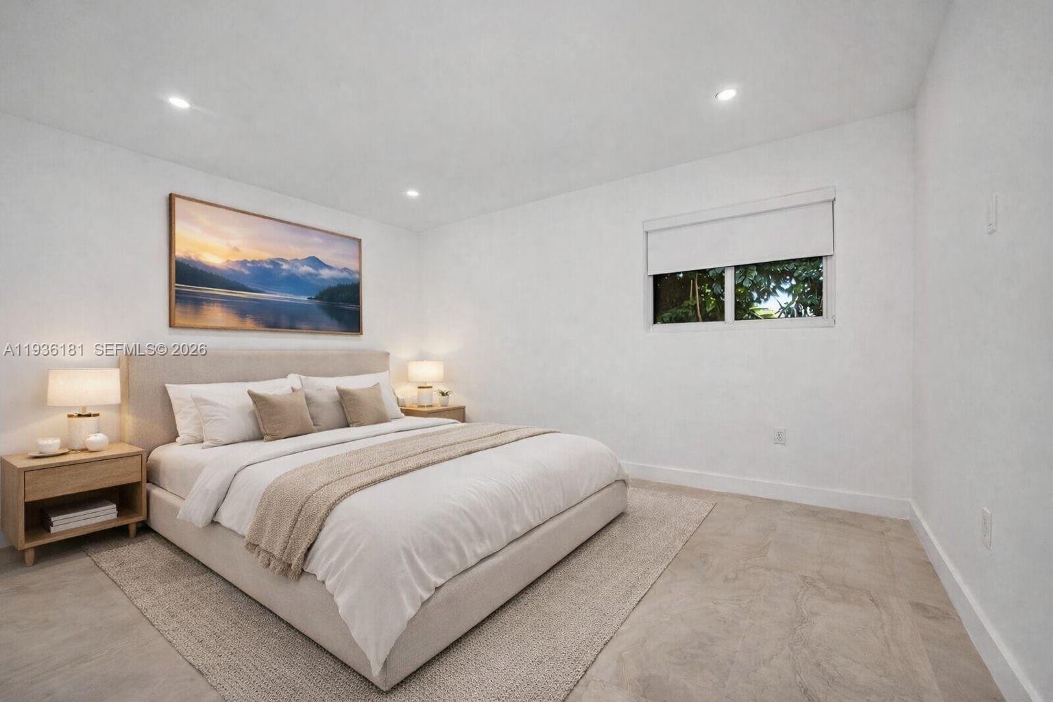 1511 Southwest 20th Court Miami, FL 33145 - Photo 28 of 41 a bedroom with a bed and a painting