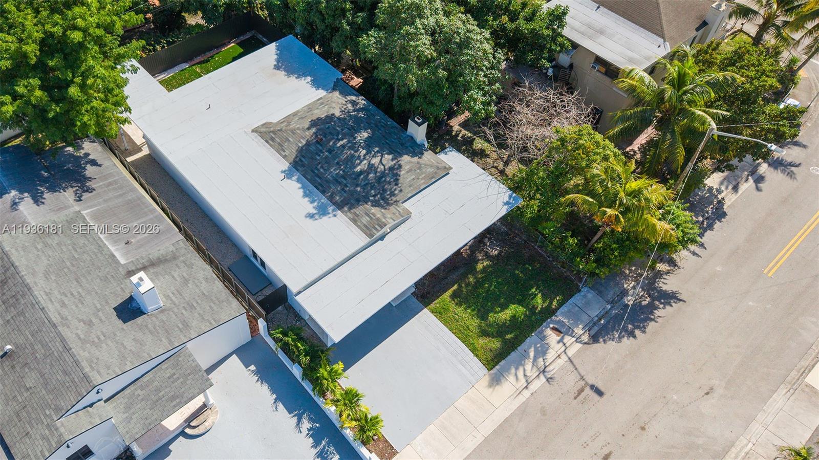 1511 Southwest 20th Court Miami, FL 33145 - Photo 3 of 41 an aerial view of a house with a yard and potted plants
