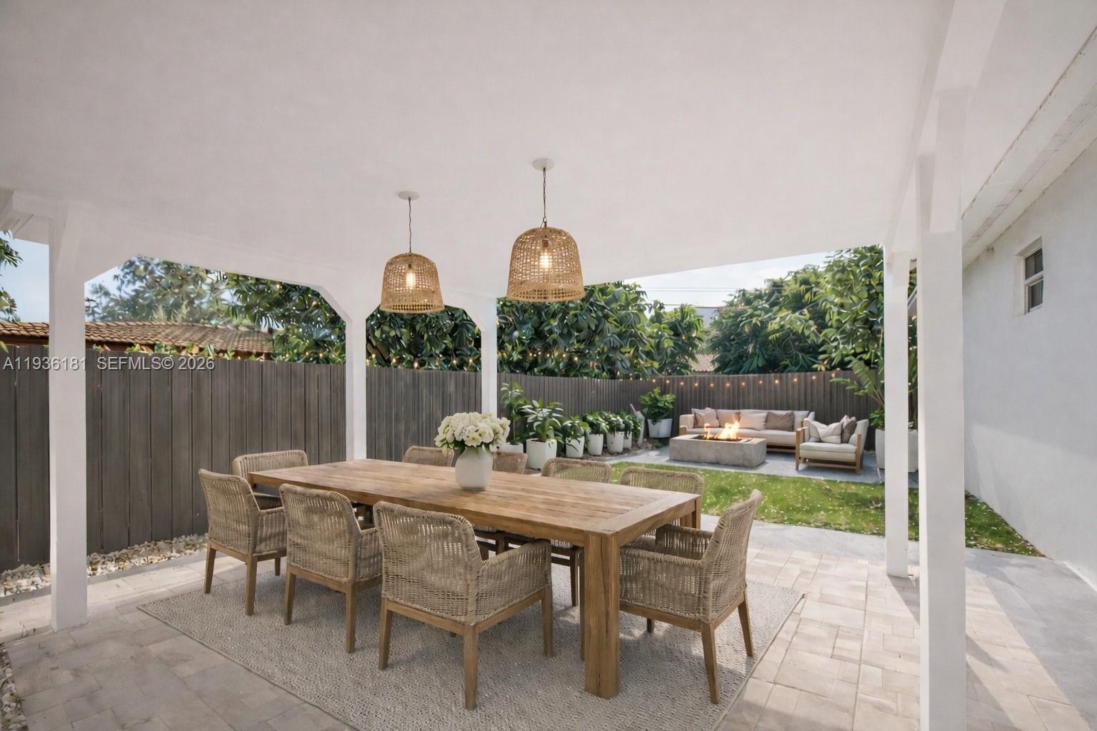 1511 Southwest 20th Court Miami, FL 33145 - Photo 36 of 41 a dining area with a table and chairs