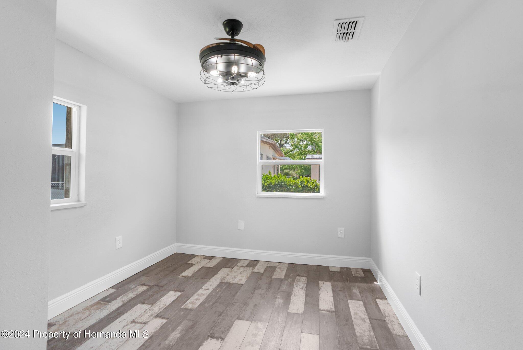 5411 Teal Drive Weeki Wachee, FL 34607 - Photo 18 of 40 a view of an empty room and window