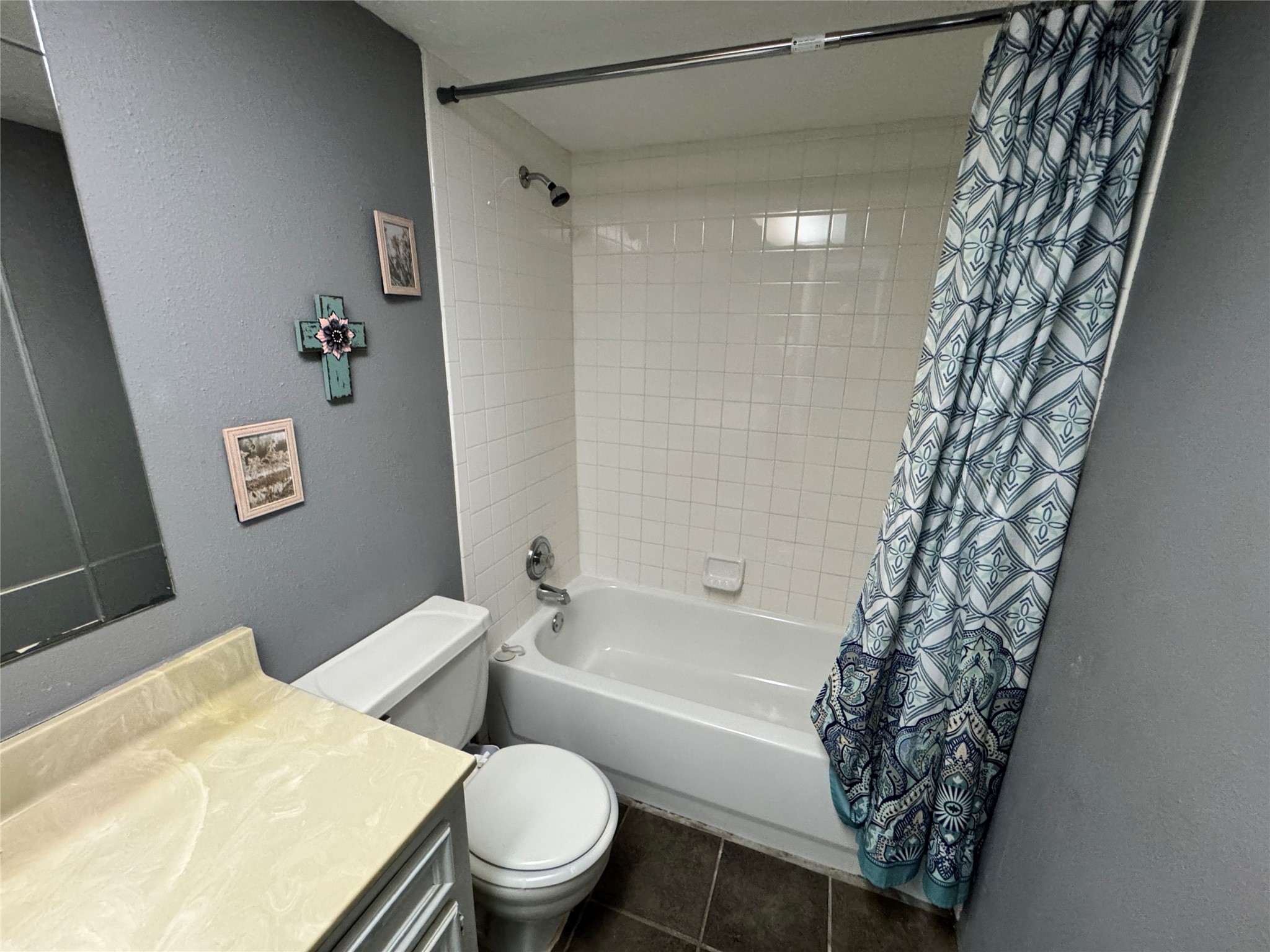 8519 Church Light Lane Houston, TX 77064 - Photo 15 of 24 a white toilet sitting next to a bath tub