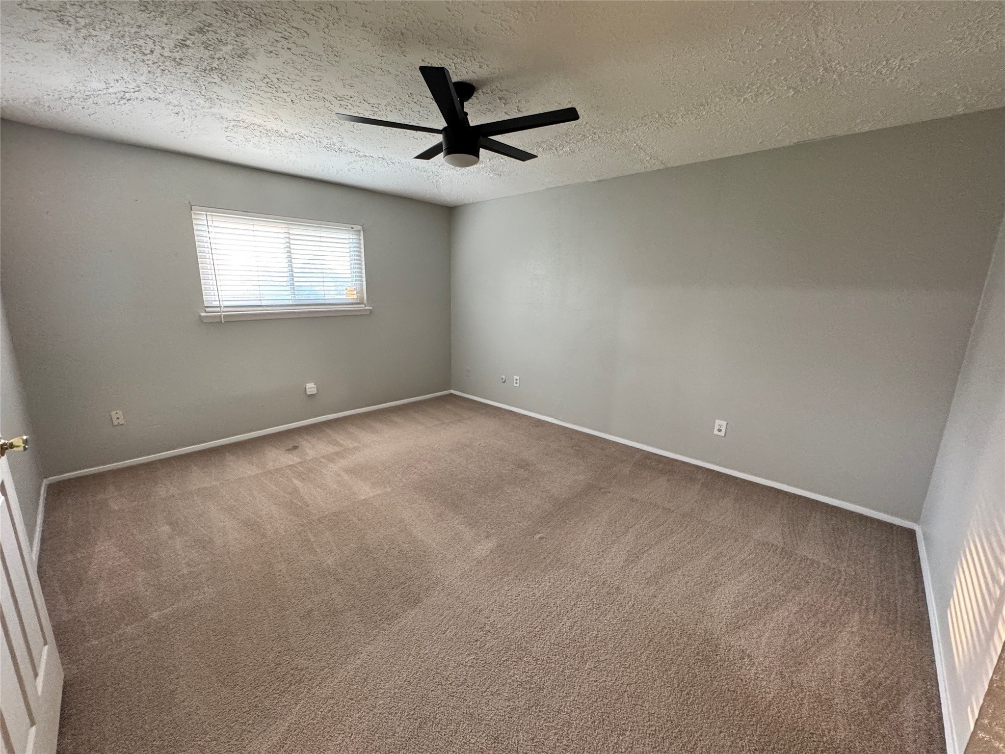 8519 Church Light Lane Houston, TX 77064 - Photo 16 of 24 a view of an empty room with a window