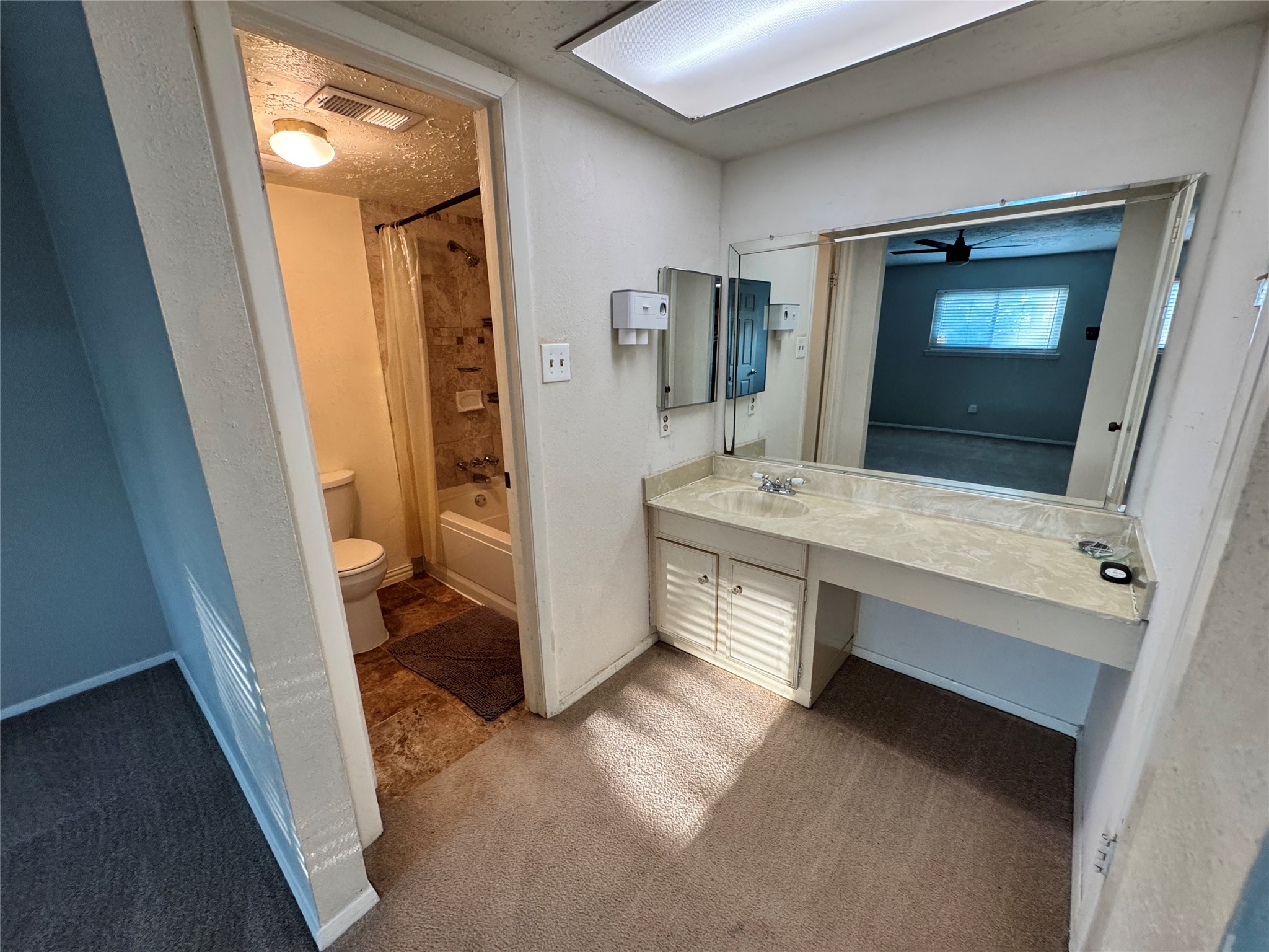 8519 Church Light Lane Houston, TX 77064 - Photo 17 of 24 a view of a hallway view with furniture and bathroom view