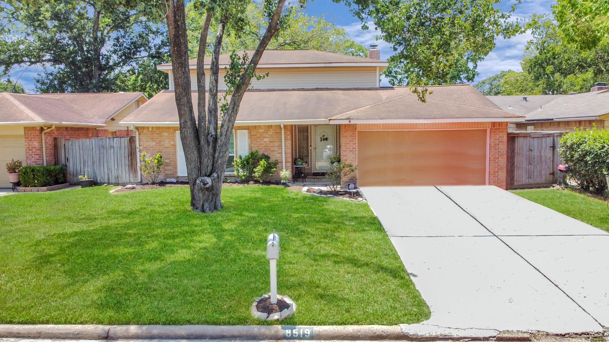 8519 Church Light Lane Houston, TX 77064 - Photo 2 of 24 a front view of house with yard