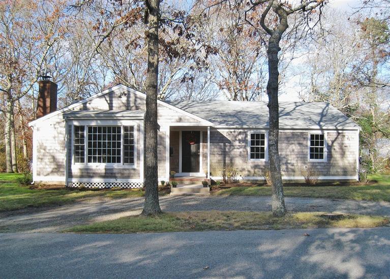 6 Fox Hill Road Centerville, MA 02632 - Photo 1 of 21 front view of a house with a tree in front