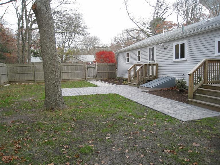 6 Fox Hill Road Centerville, MA 02632 - Photo 11 of 21 a view of backyard of the house