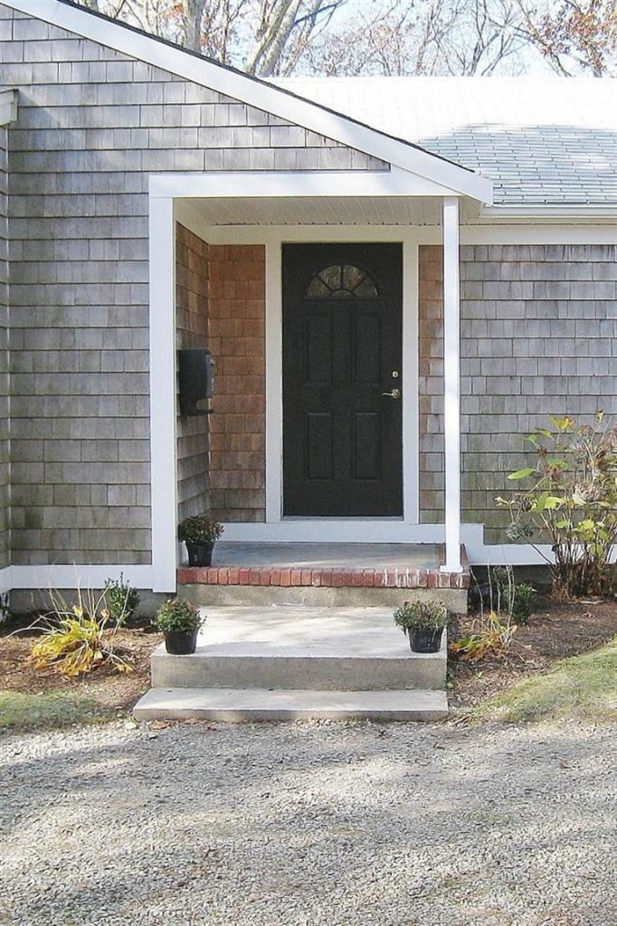 6 Fox Hill Road Centerville, MA 02632 - Photo 16 of 21 a view of a brick house with a outdoor space