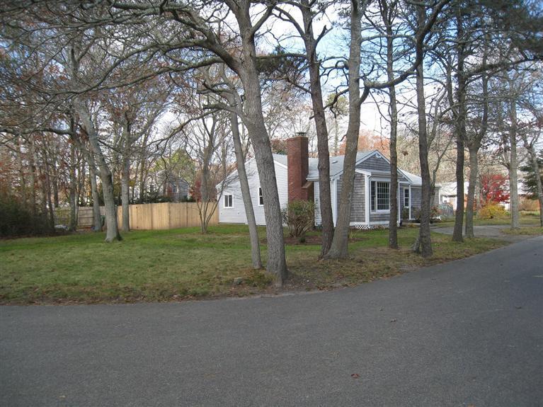 6 Fox Hill Road Centerville, MA 02632 - Photo 17 of 21 front view of a house with a yard