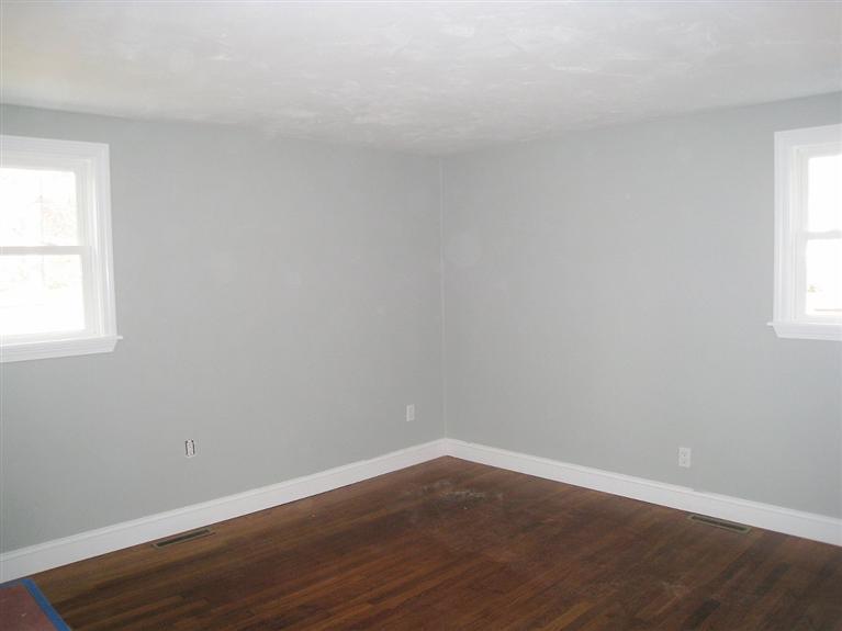 6 Fox Hill Road Centerville, MA 02632 - Photo 6 of 21 an empty room with wooden floor and windows