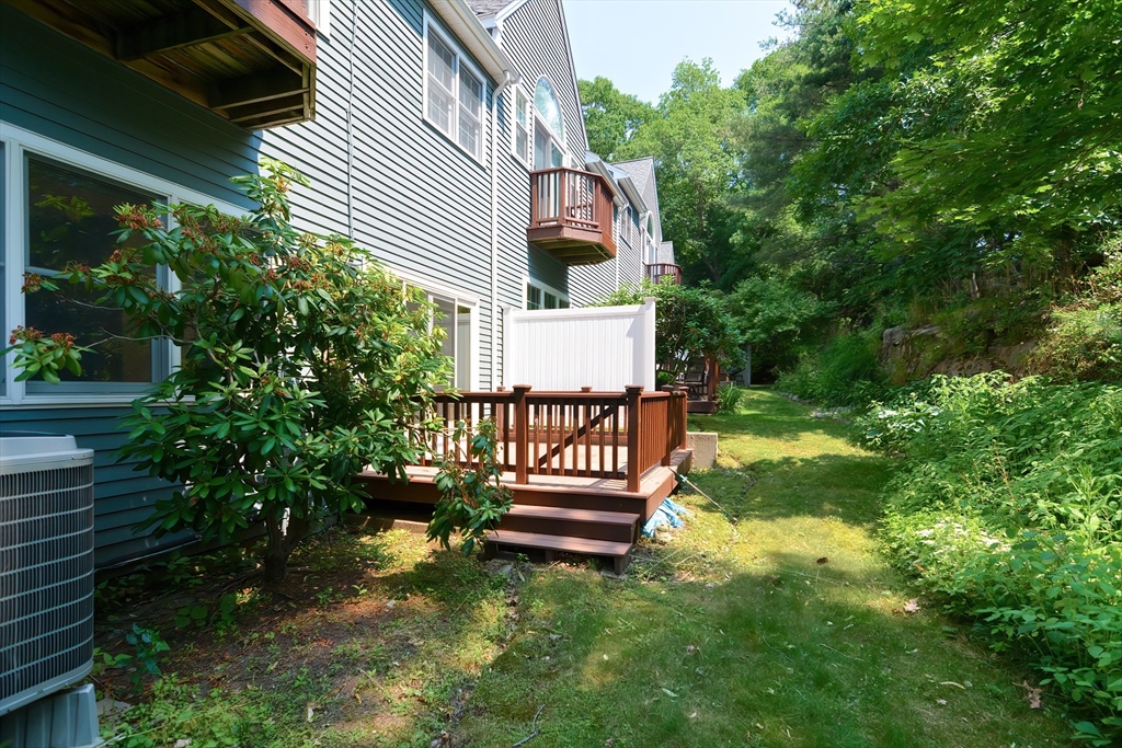 327 Bishops Forest Drive, Unit 327 Waltham, MA 02452 - Photo 38 of 38 a view of a back yard