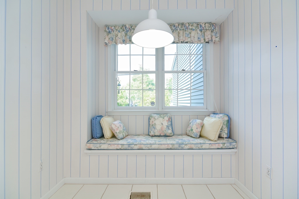 327 Bishops Forest Drive, Unit 327 Waltham, MA 02452 - Photo 6 of 38 a room with a window and a table