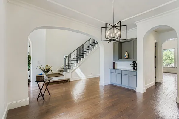 a view of a living room and wooden floor