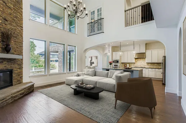 a living room with furniture fireplace and a fireplace