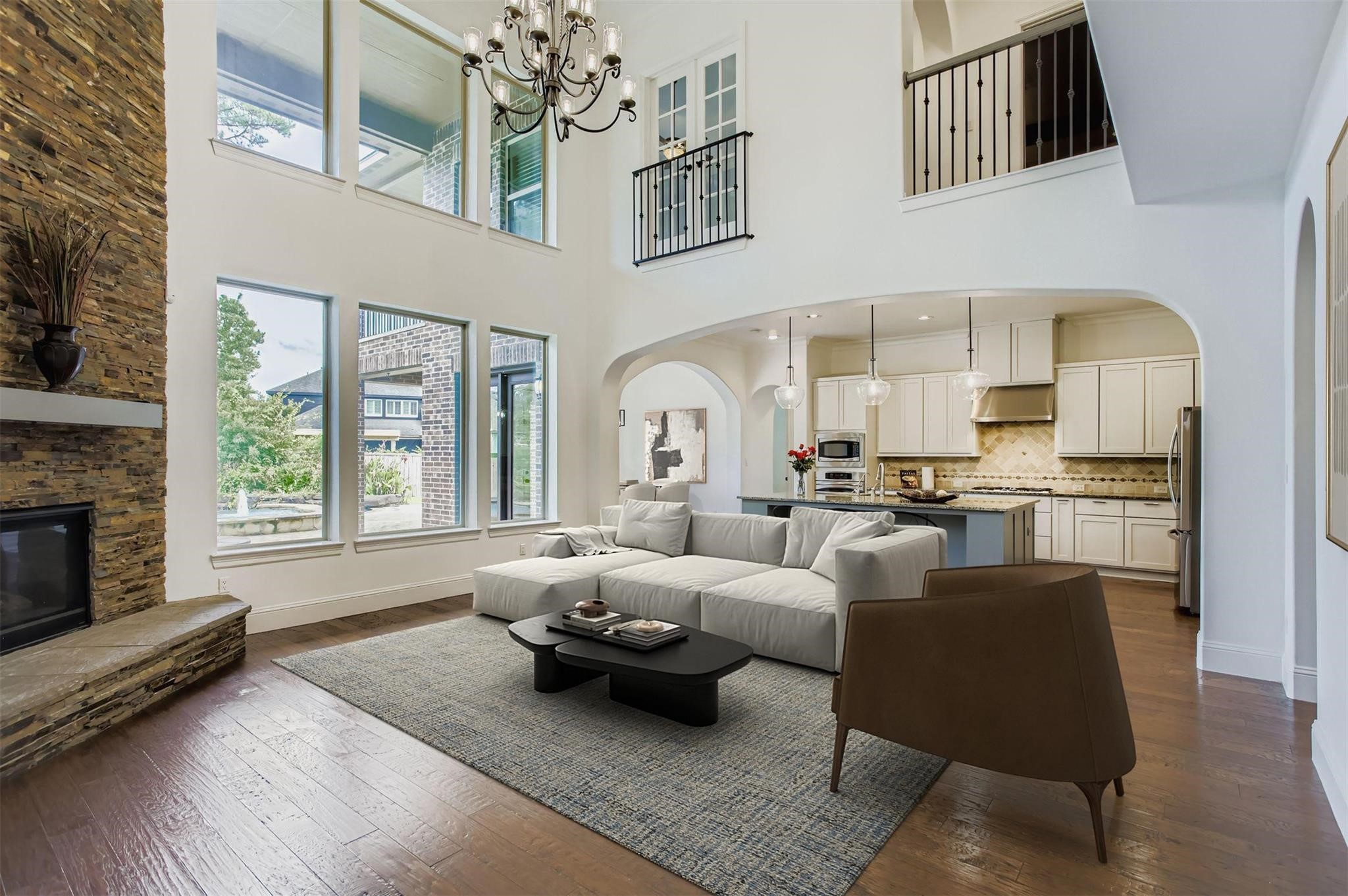 6 Freestone Stream Place The Woodlands, TX 77389 - Photo 15 of 50 a living room with furniture fireplace and a fireplace