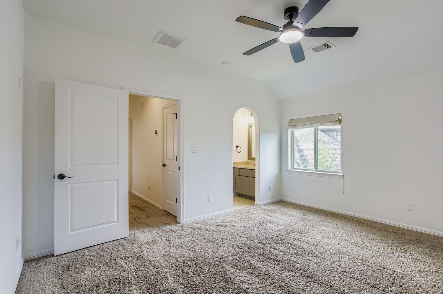 6 Freestone Stream Place The Woodlands, TX 77389 - Photo 36 of 50 a view of empty room with window and ceiling fan