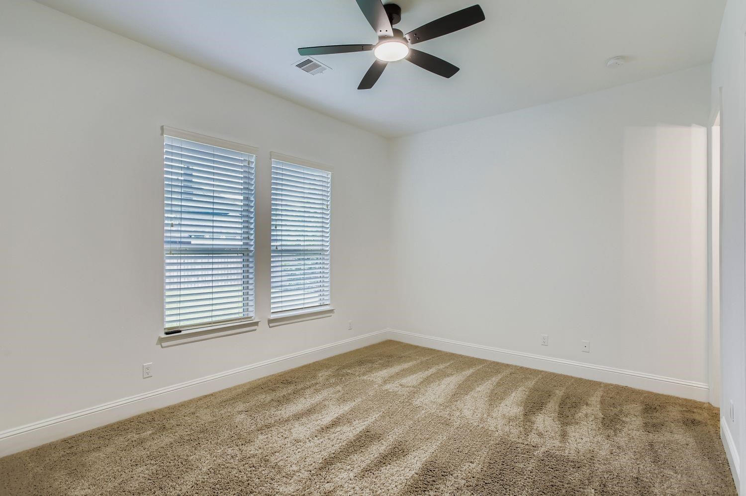 6 Freestone Stream Place The Woodlands, TX 77389 - Photo 38 of 50 a view of an empty room with a window
