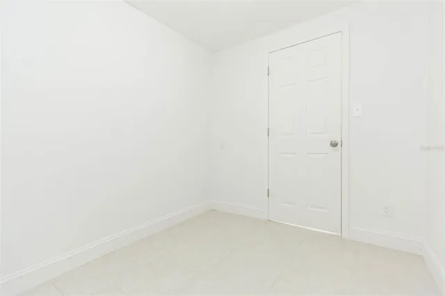 a kitchen with a stove and a microwave