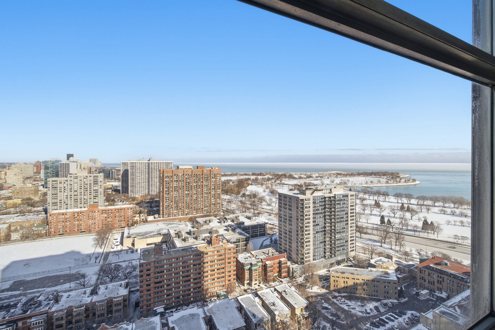 655 West Irving Park Road, Unit 2916 Chicago, IL 60613 - Photo 17 of 28 a view of a city with tall buildings