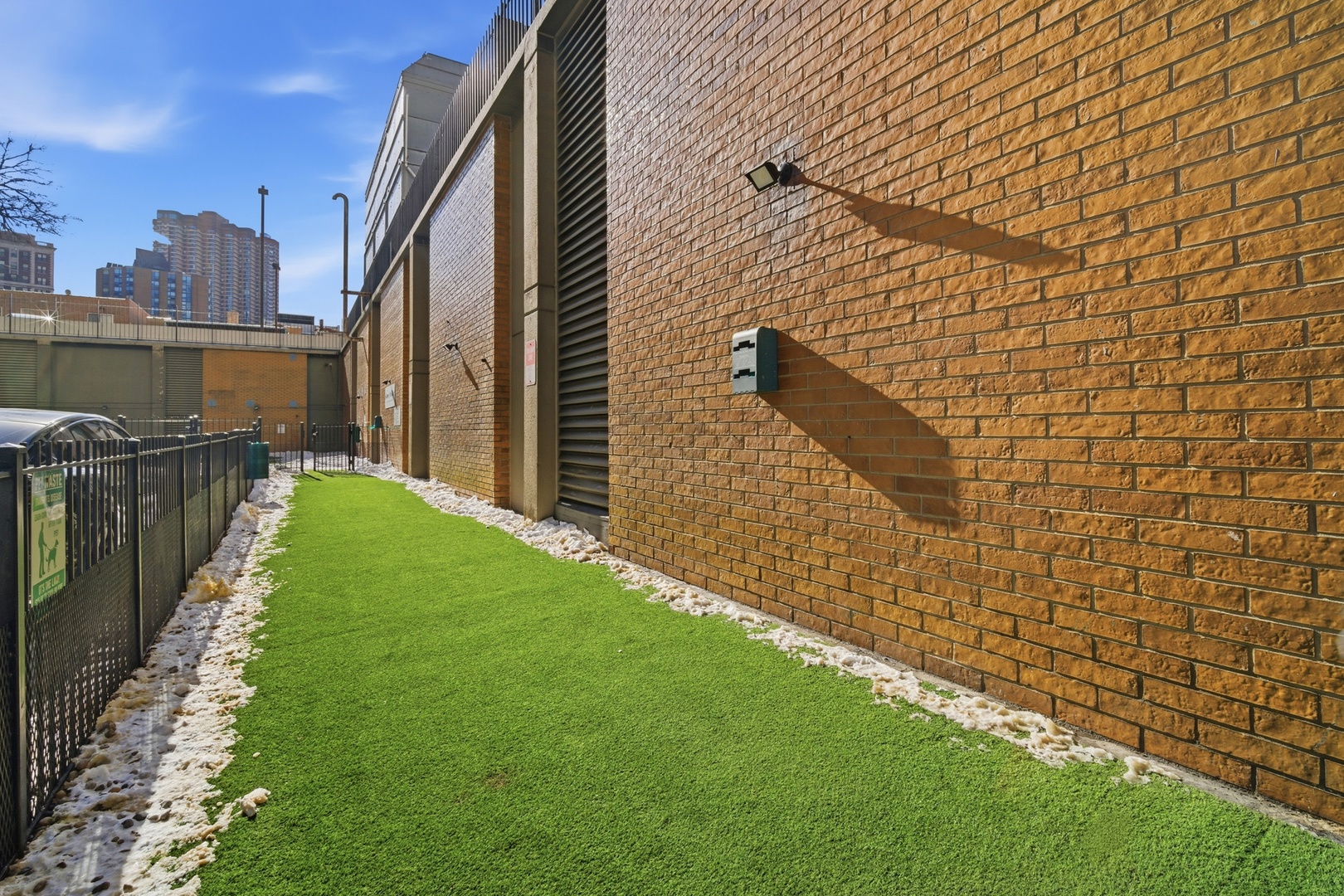 655 West Irving Park Road, Unit 2916 Chicago, IL 60613 - Photo 22 of 28 a view of a back yard