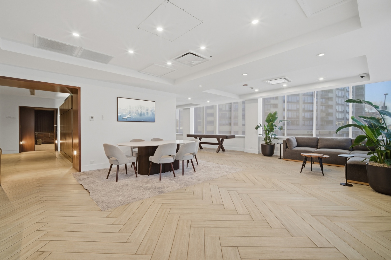 655 West Irving Park Road, Unit 2916 Chicago, IL 60613 - Photo 24 of 28 a living room with furniture potted plant and a table