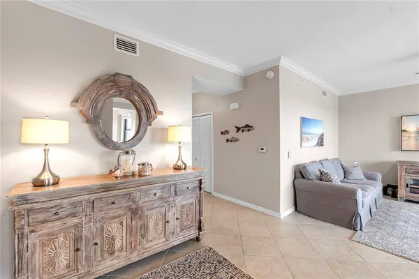 a bathroom with a double vanity sink a mirror and a bathtub