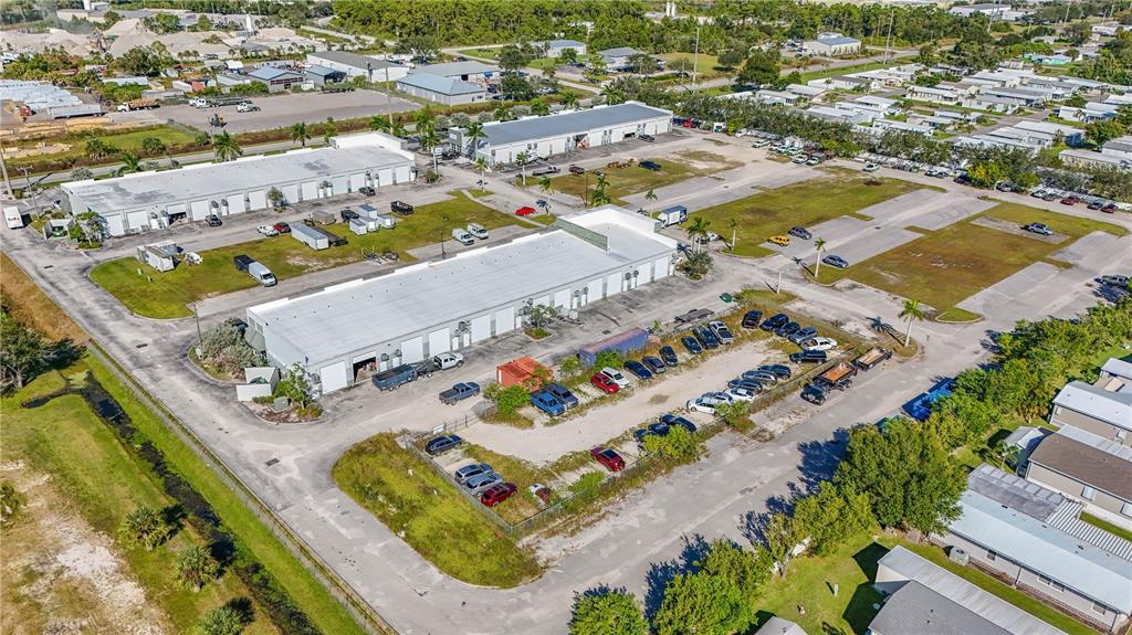6640 Taylor Road, Unit B Punta Gorda, FL 33950 - Photo 3 of 8 an aerial view of residential houses with outdoor space