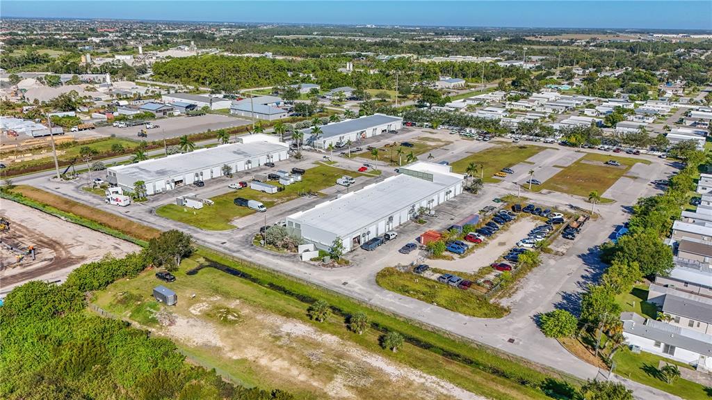 6640 Taylor Road, Unit B Punta Gorda, FL 33950 - Photo 4 of 8 an aerial view of residential houses with outdoor space