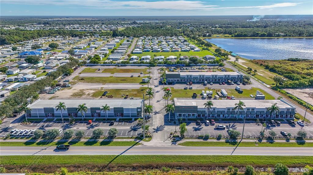 6640 Taylor Road, Unit B Punta Gorda, FL 33950 - Photo 6 of 8 a view of a city with tall buildings