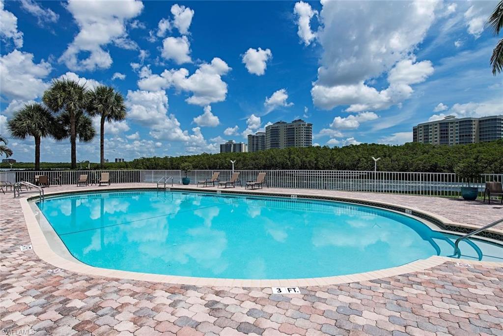3 Bluebill Avenue, Unit 704 Naples, FL 34108 - Photo 12 of 12 a view of a swimming pool