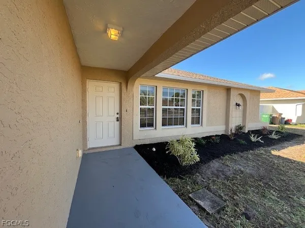 a front view of a house with windows