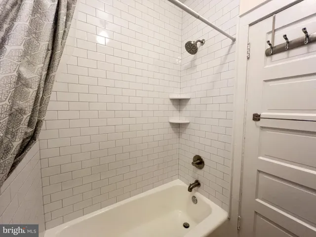 a bathroom with a bathtub