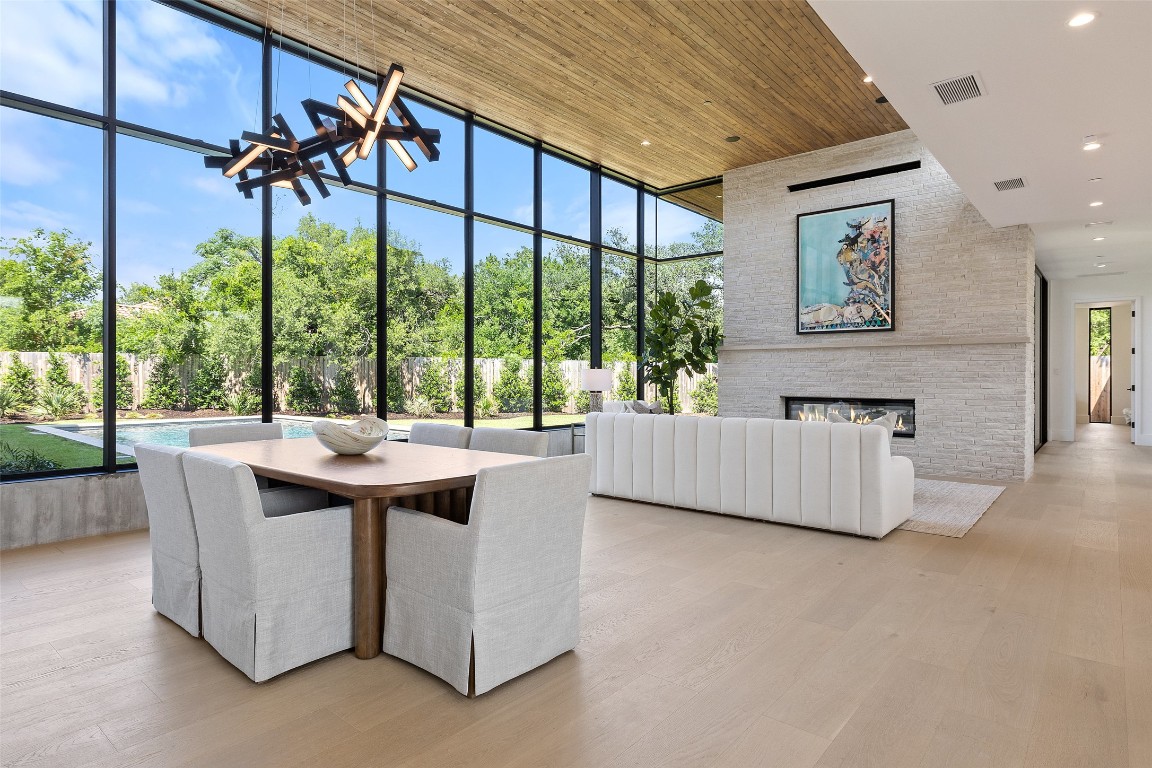 a dining room with large window