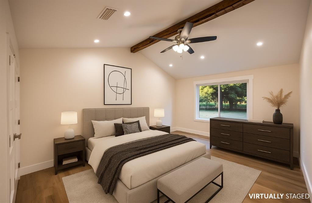 4505 Harrison Street Bellmead, TX 76705 - Photo 26 of 39 a bedroom with a large bed and a window