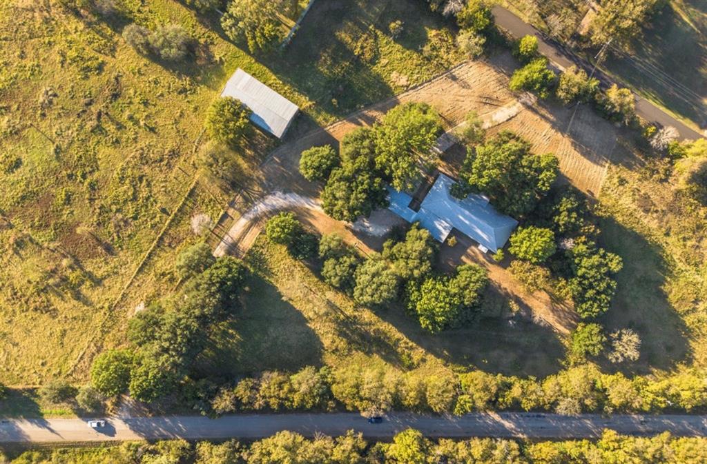 4505 Harrison Street Bellmead, TX 76705 - Photo 38 of 39 a yard with a tree