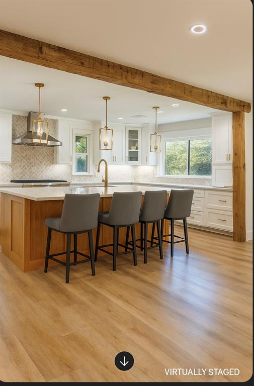 4505 Harrison Street Bellmead, TX 76705 - Photo 7 of 39 a view of a dining room with furniture and wooden floor