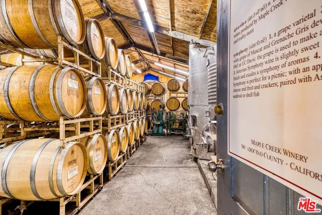 a front view of a house with parking space