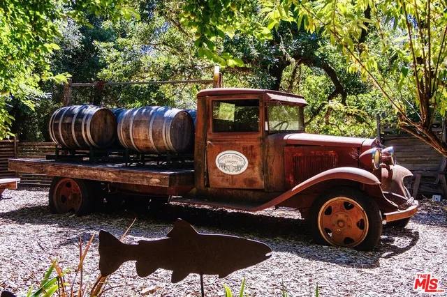 a street sign and flowers
