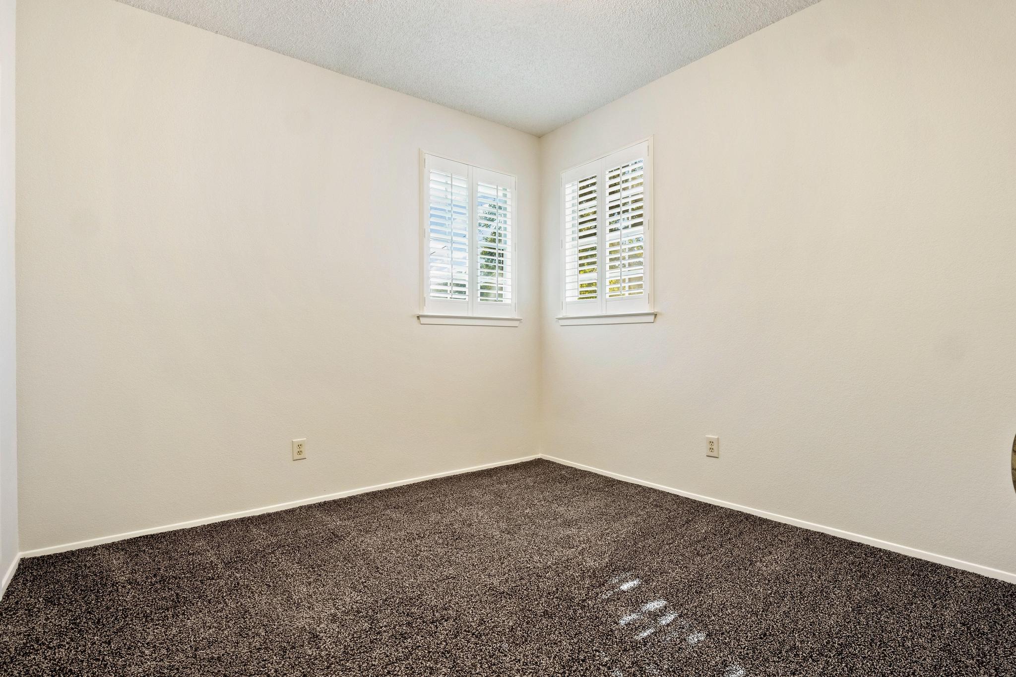 6501 Brush Country Road, Unit 109 Austin, TX 78749 - Photo 18 of 26 an empty room with a window