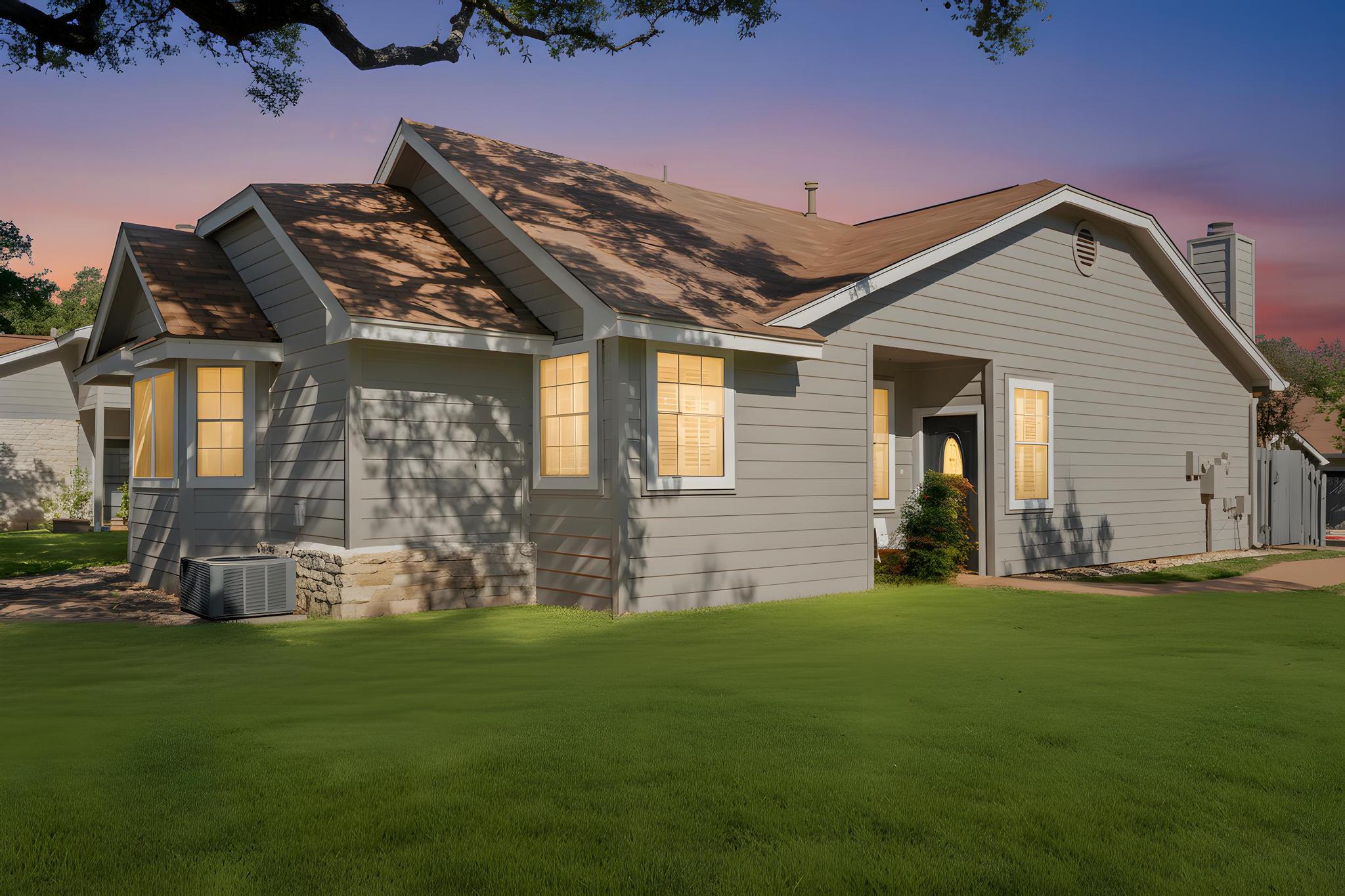 6501 Brush Country Road, Unit 109 Austin, TX 78749 - Photo 26 of 26 a backyard of a house with table and chairs