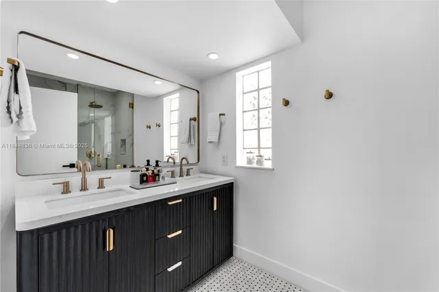 a bathroom with a toilet and shower