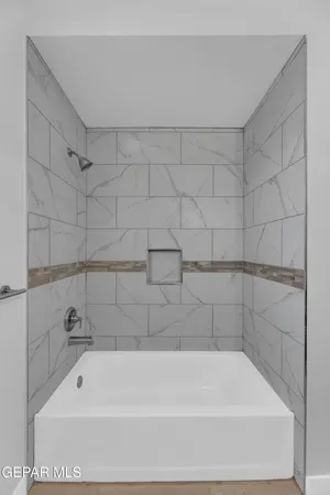 a bathroom with a bathtub