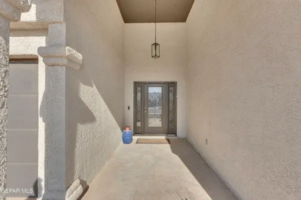 a view of a hallway with windows