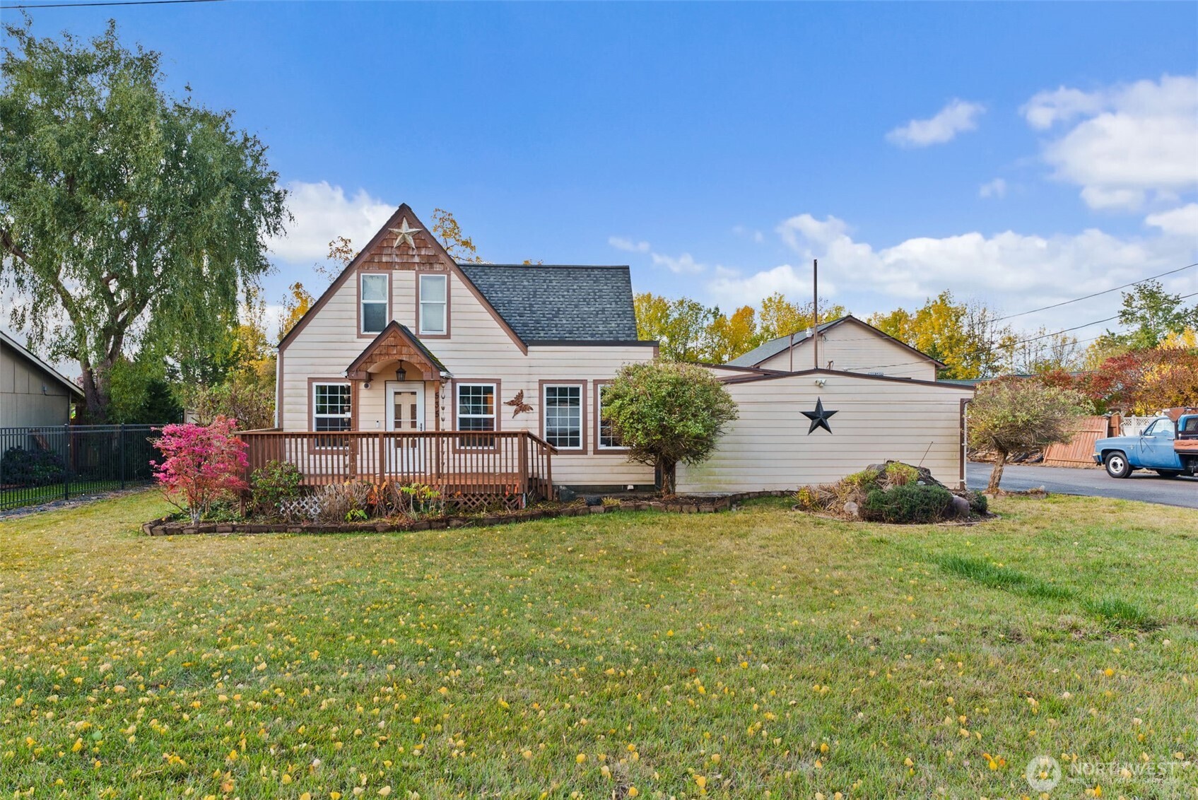 a front view of a house with garden